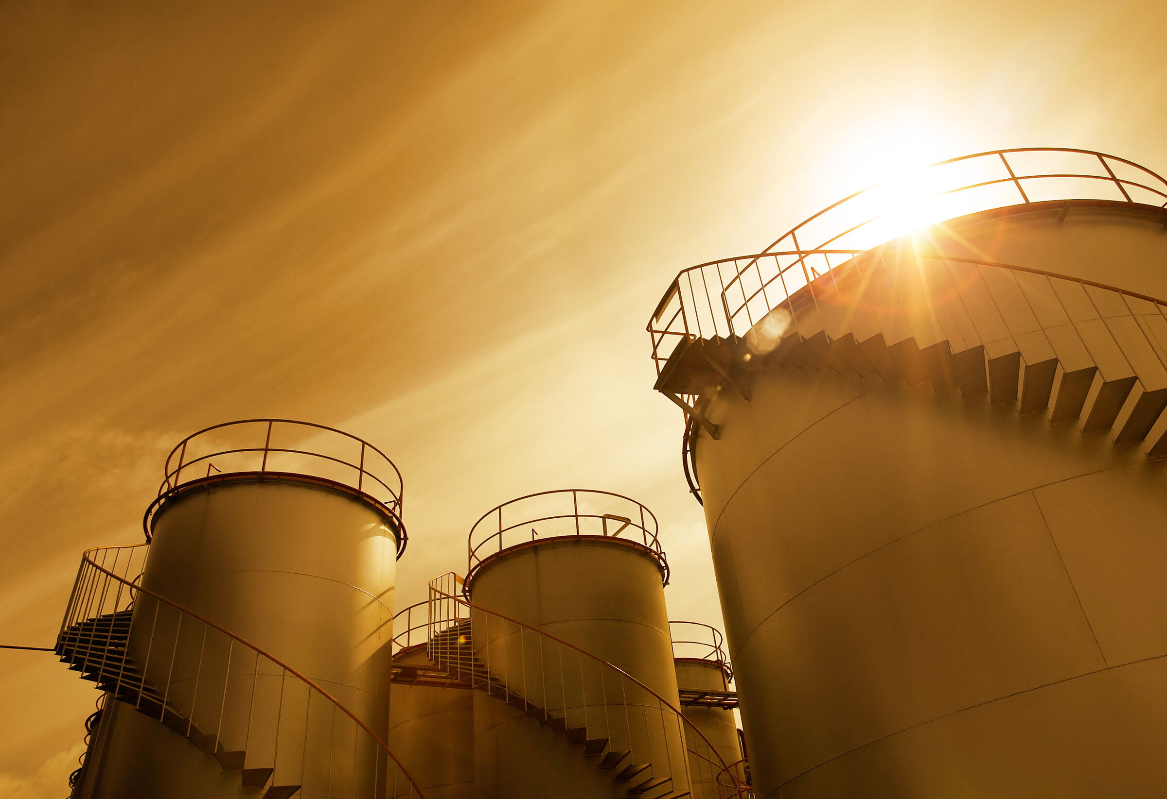 Above-ground industrial storage tanks undergoing integrity inspection